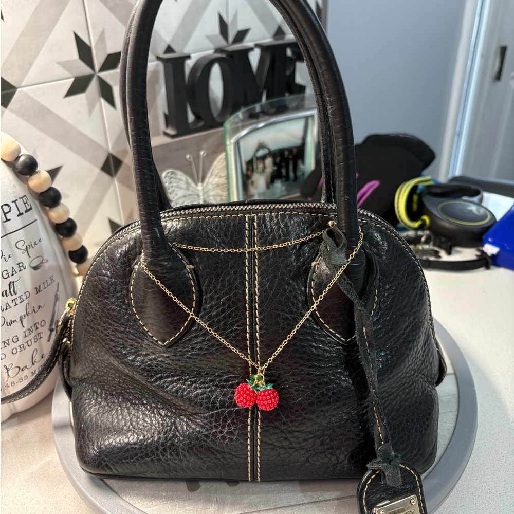 Dooney & Bourke Vintage Black Satchel w/ charm bracelet EUC